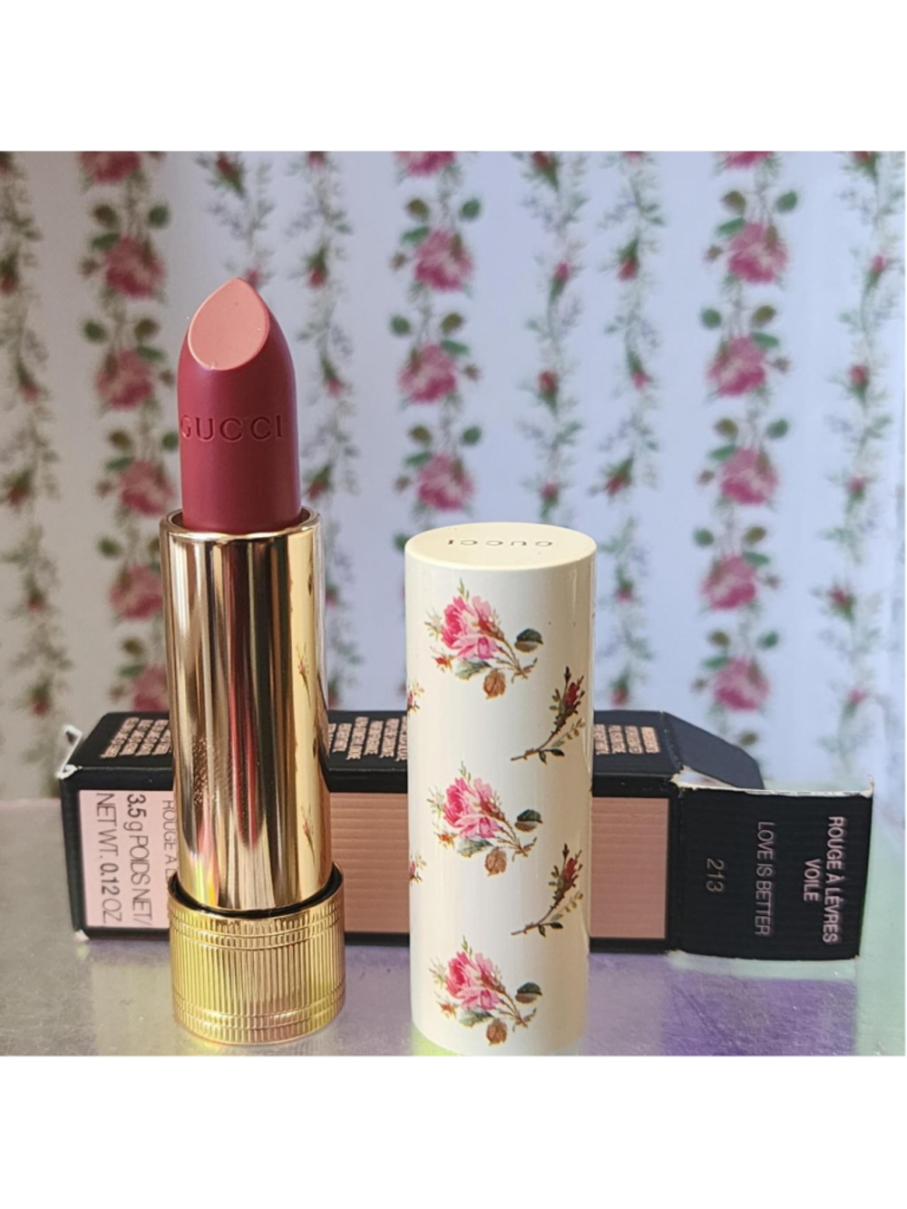 Gucci lipstick in shade 213 Love is Better